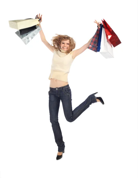 Feliz rubia bailando con bolsas de papel — Foto de Stock