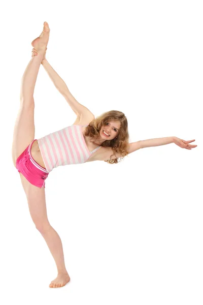 Happy girl in sportswear does gymnastic exercise — Stock Photo, Image