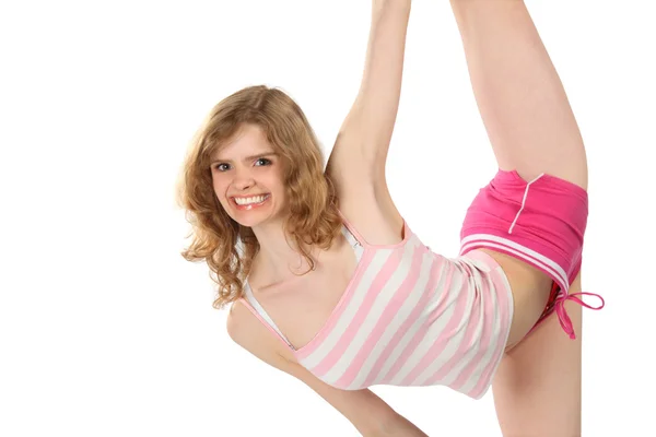 Happy girl in sportswear does gymnastic exercise — Stock Photo, Image