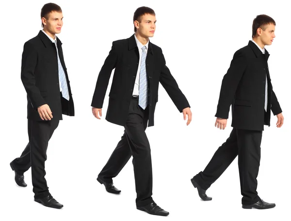 Giovane uomo d'affari cammina — Foto Stock