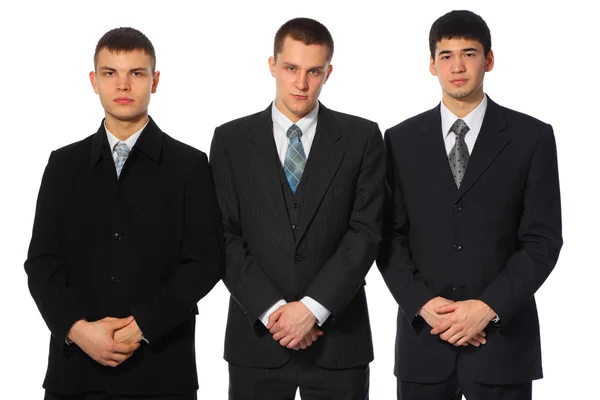 Three standing young businessmen — Stock Photo, Image