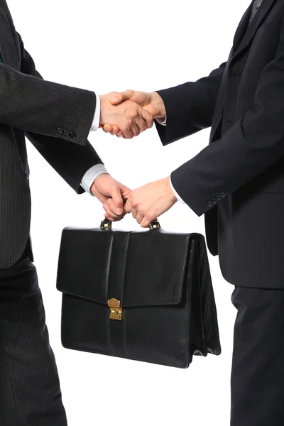 One businessman gives another briefcase — Stock Photo, Image