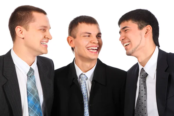 Tres jóvenes empresarios se ríen —  Fotos de Stock