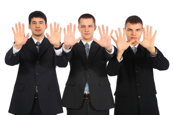 Tre unga affärsmän Visa öppna handflator — Stockfoto