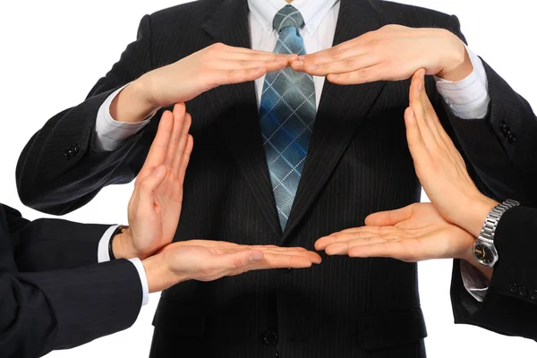 Empresários representam o retângulo de mãos — Fotografia de Stock