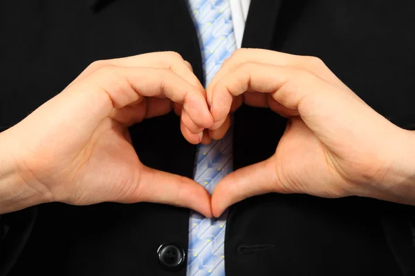 Man is showing a love sign from his hands — Stock Photo, Image