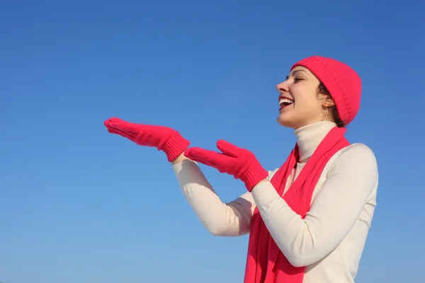 Young woman in red gloves — Stock Photo, Image