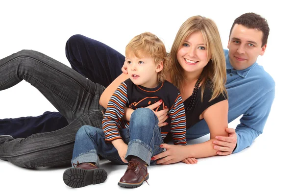 Happy parents with son laying — Stock Photo, Image
