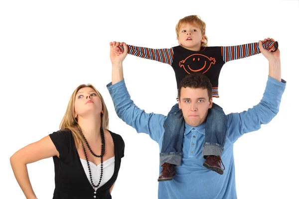 Mother and father with son on shoulders — Stock Photo, Image