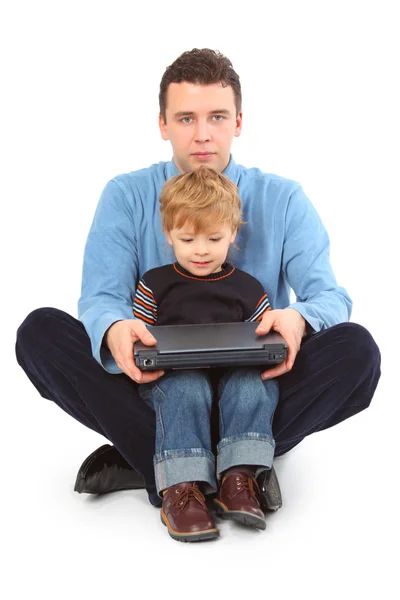 Vater und Sohn mit Laptop — Stockfoto