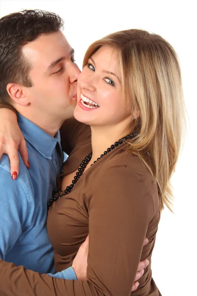 Homem beija jovem mulher — Fotografia de Stock