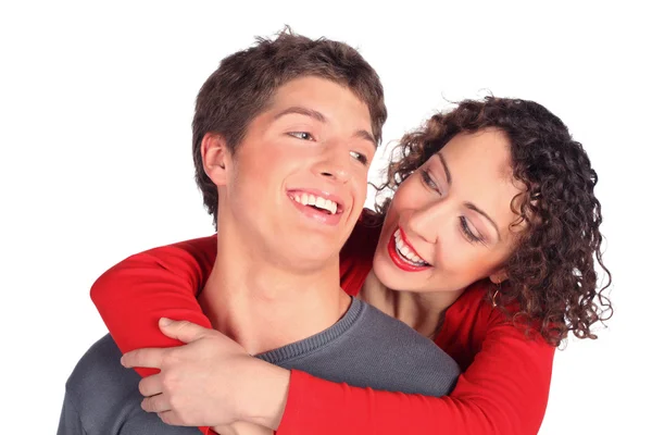 Joven pareja abraza y sonríe —  Fotos de Stock