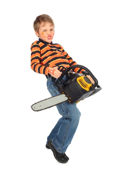 Junge mit Kettensäge für den Urlaub bemalt — Stockfoto