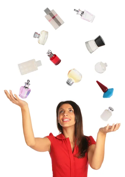 Vrouw opzoeken en jongleren parfums collage — Stockfoto