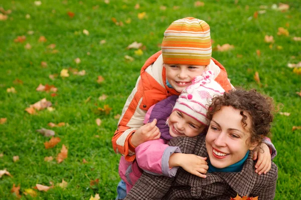Mother with children in park — Stock Photo, Image