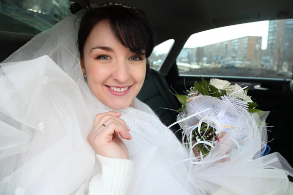 Bride in car — Stock Photo, Image