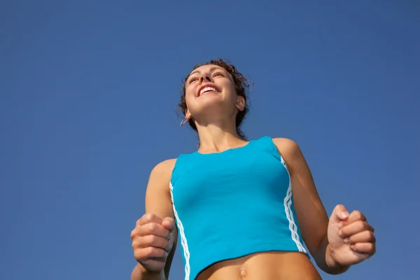 Sporty woman runner, view from below — Stock Photo, Image