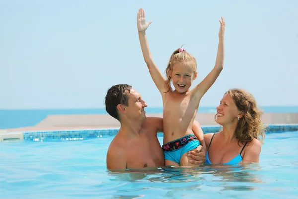 Family in pool — Stock Photo, Image