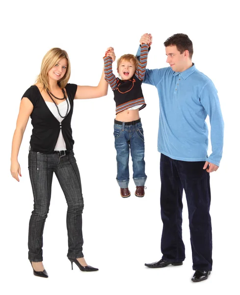Ouders houden zoon voor handen, volledige lichaam Stockfoto