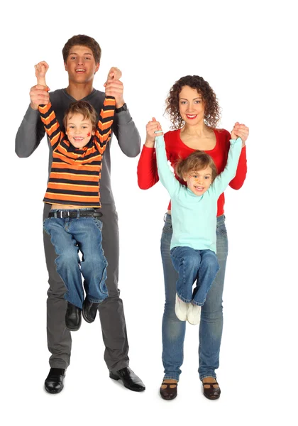 Parents hold children from hands Stock Image