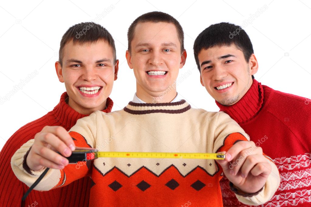 Three young men with tape measure