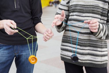 Teens with yo-yo toys clipart