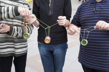 Teens with yo-yo toys clipart