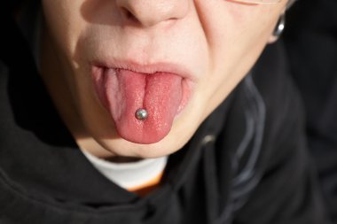 Teen shows tongue clipart