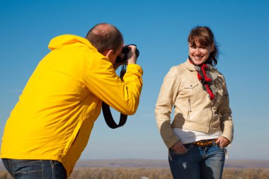 Man and girl photographed clipart