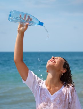 Girl with bottle of water clipart