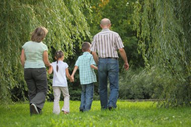 Family in early fall park clipart