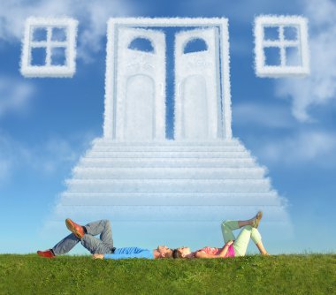 Lying couple on grass and dream door way collage clipart