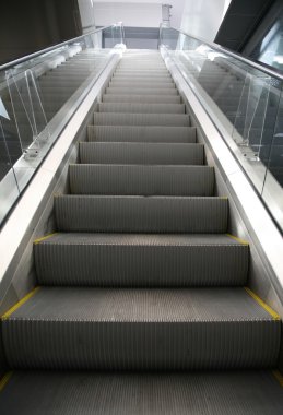 Escalator in shopping center clipart