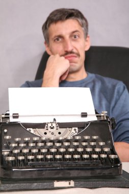 Man and typewriter 2 clipart