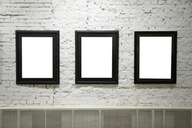 Black frames on white brick wall clipart
