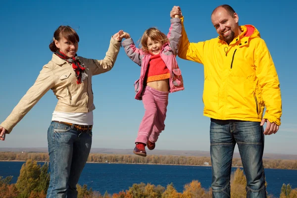 Family of four sunny autumn day — Stock Photo, Image