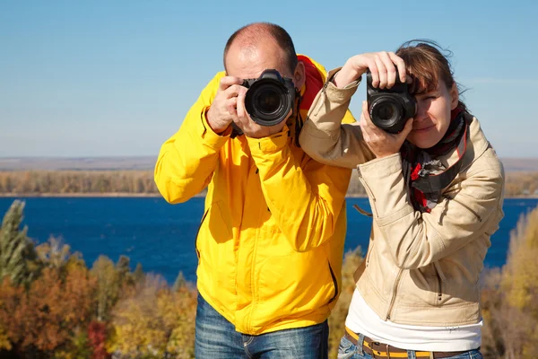 Mann und Mädchen fotografiert — Stockfoto