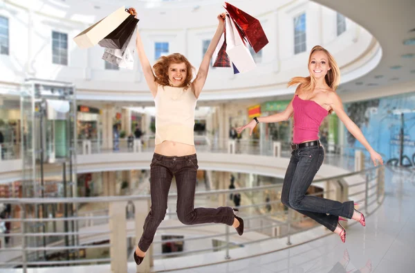 Skákání dívky v business centru, koláž — Stock fotografie