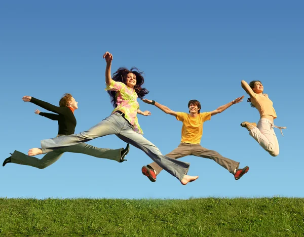 Many jumping on the grass, collage — Stock Photo, Image
