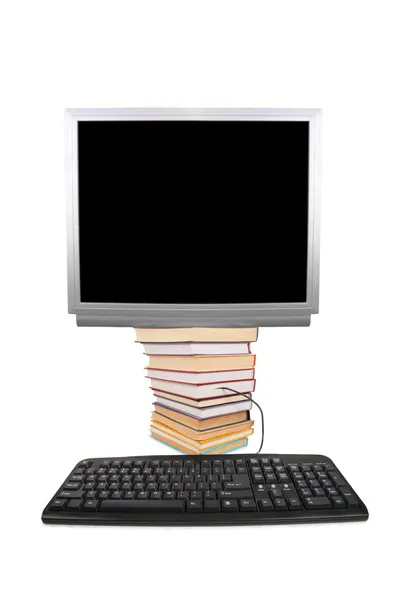 Monitor auf den Büchern mit der Tastatur, Collage — Stockfoto