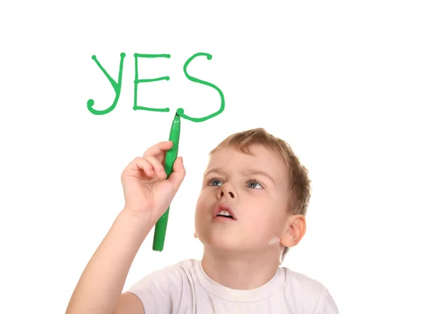 Хлопчик малює слово YES за фетровою ручкою, колаж — стокове фото