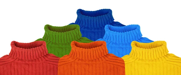 Пирамида из многоцветных радужных свитеров коллаж — стоковое фото