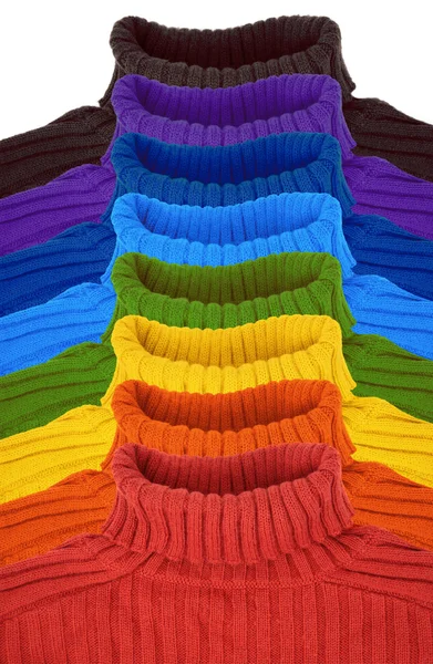 stock image Group of multi color rainbow sweaters collage