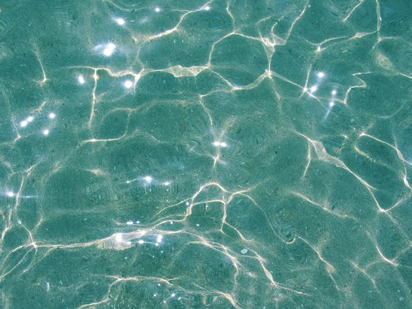 Lichte zwembad rimpelingen water — Stockfoto