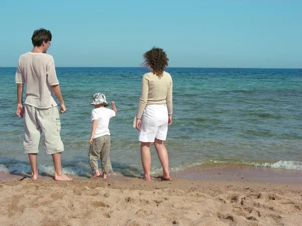Familie zee zand — Stockfoto