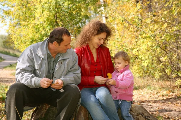 Mother with the daughter and the grandfather in the park in autumn 2 — Stock Photo, Image