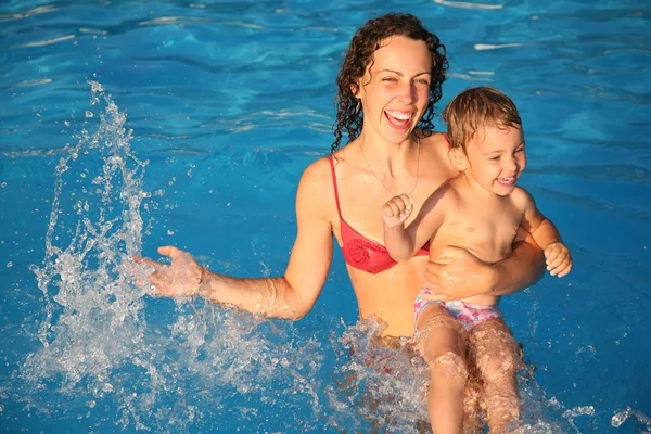 Mother with the child in the water — Stock Photo, Image