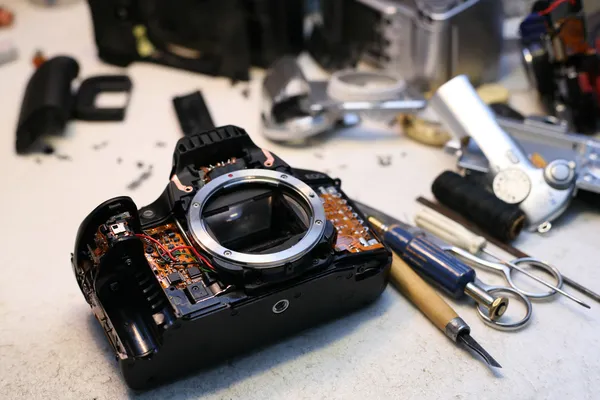 Photo camera repair — Stock Photo, Image