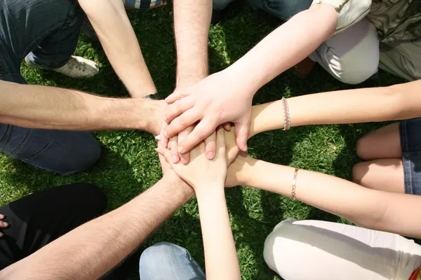 Friends have combined hands together — Stock Photo, Image