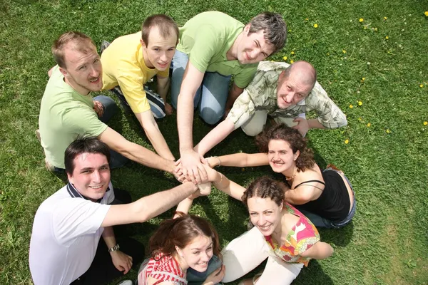 Eight friends have combined hands together — Stock Photo, Image